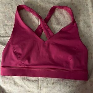 Lululemon sport bra size 8 color pink in excellent condition just wear one.